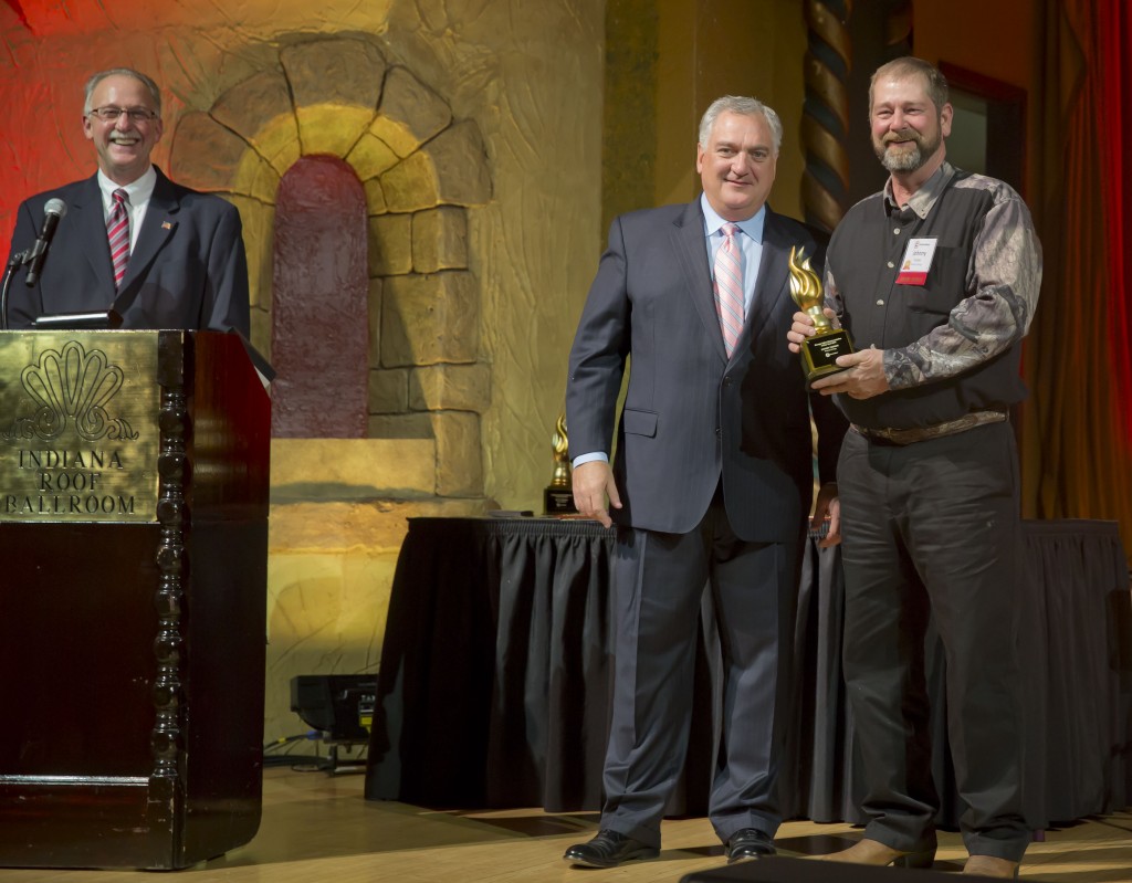 Premier Energy Employee Johnny Tedder (far right) was recently named Petroleum Sales Representative of the Year. 